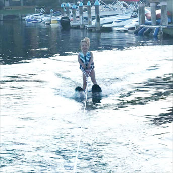 little girl waterskiing on Wood Lake