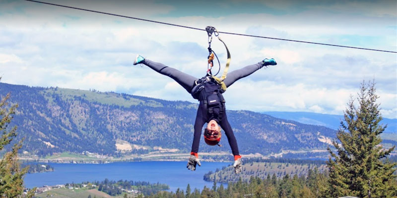 lady ziplining upside down